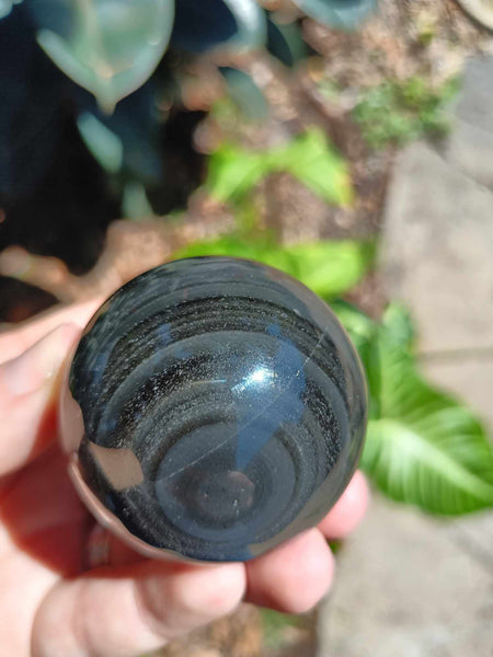 Black Obsidian Crystal Sphere with iron inclusion