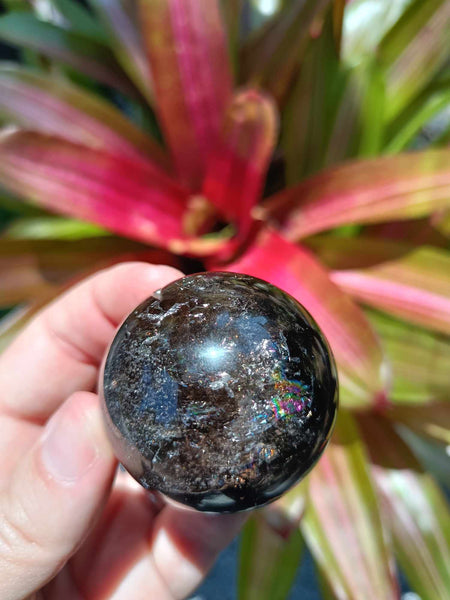 Smokey Quartz Crystal Sphere with plethora of rainbows