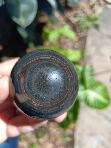 Black Obsidian Crystal Sphere with iron inclusion