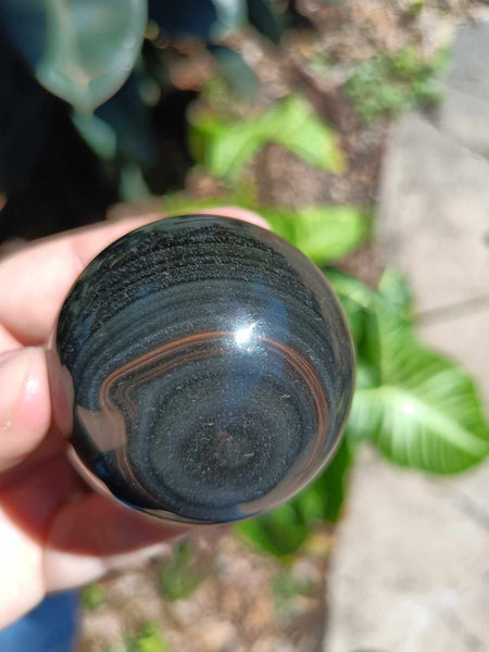 Black Obsidian Crystal Sphere with iron inclusion