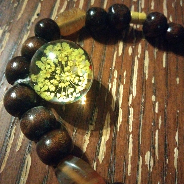 Yellow wooden beaded Necklace with Wisp Pendant by Peacemade