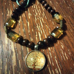 Wooden beaded Necklace with Family Tree Pendant by Peacemade