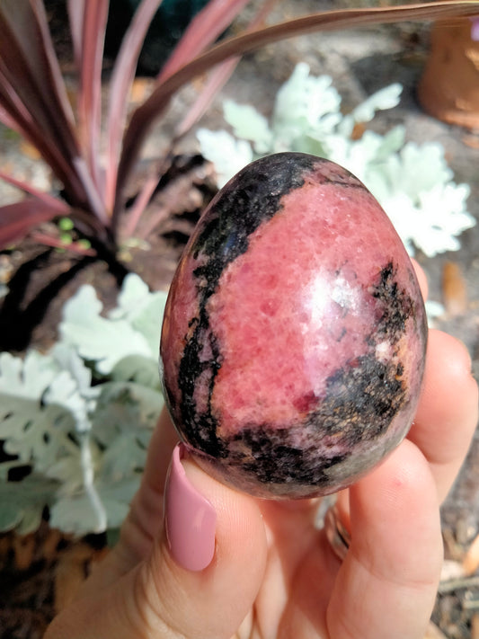 A+ Rhodonite Crystal Egg