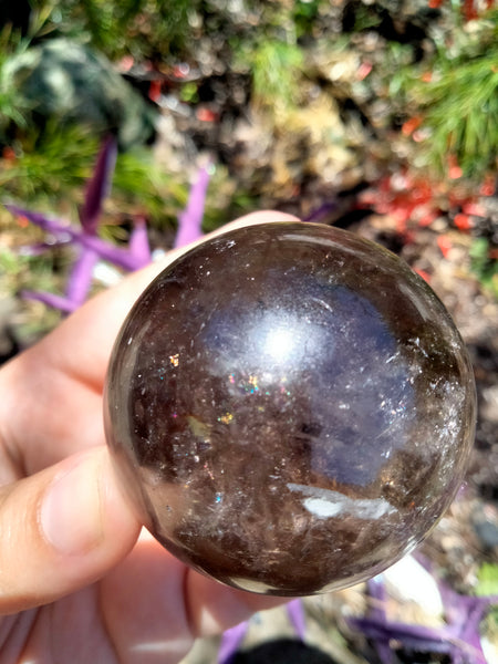 Smokey Quartz Crystal Sphere with plethora of rainbows