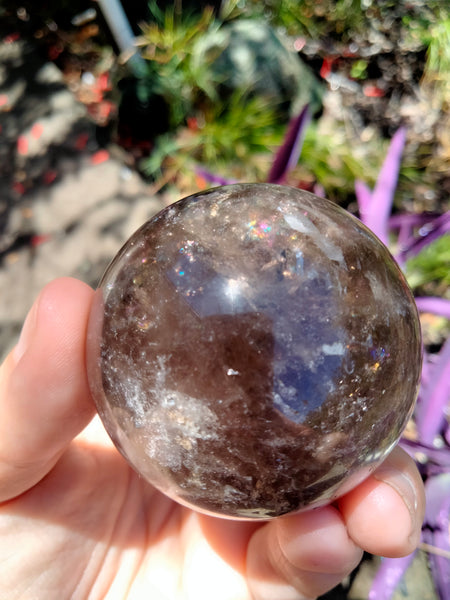 Smokey Quartz Crystal Sphere with plethora of rainbows