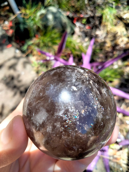 Smokey Quartz Crystal Sphere with plethora of rainbows