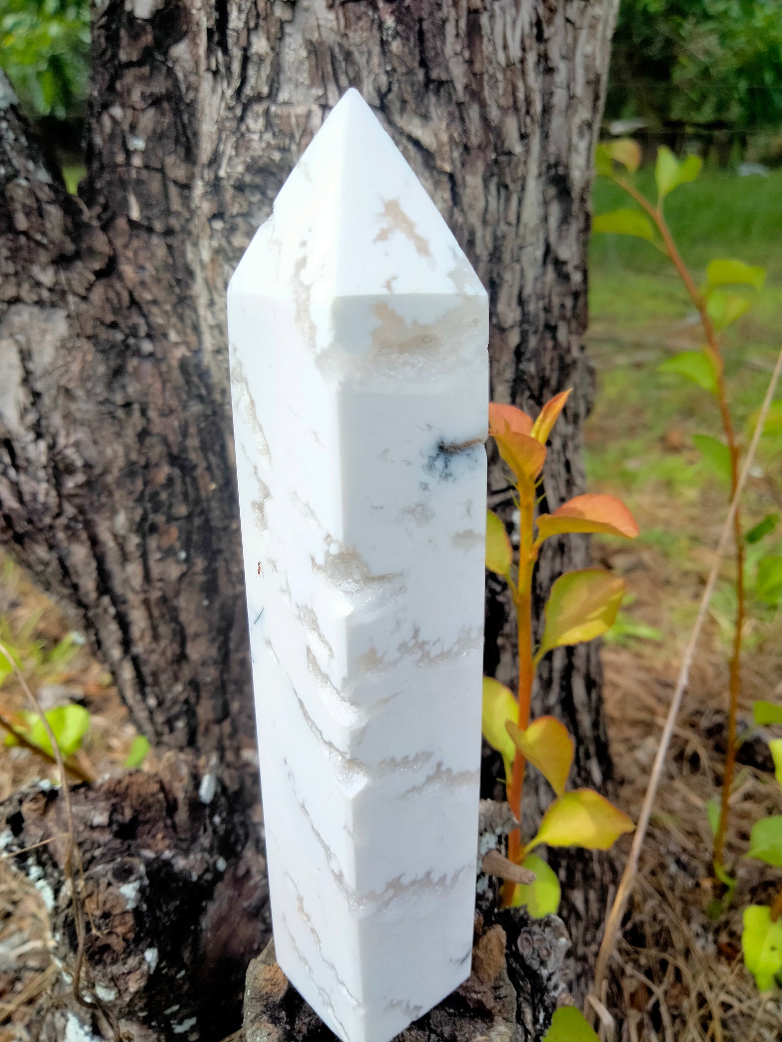 White lace agate with durzy caves in white marble stone Tower