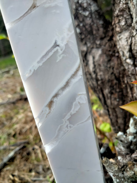 White lace agate with durzy caves in white marble stone Tower